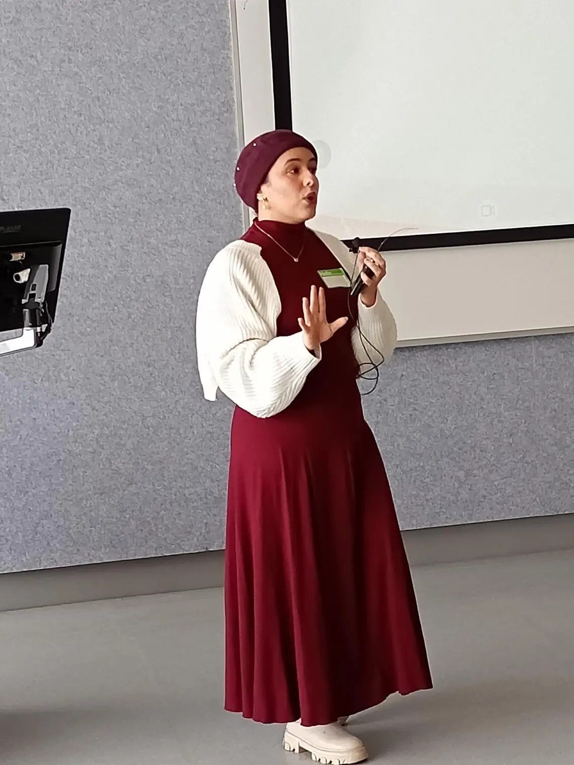 Yomna El-Ghazouly presenting